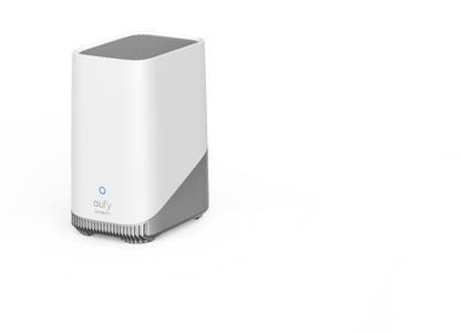 Witte Eufy Homebase 3 beveiligingshub met grijs design en blauw statuslampje op een witte achtergrond.